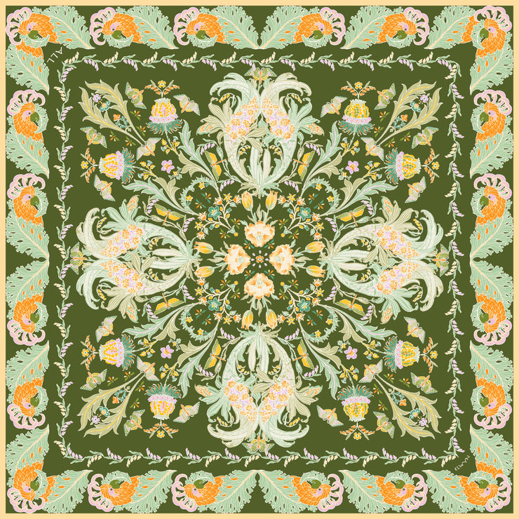 This Italian silk scarf is Art Nouveau inspired featuring a kaleidoscope of fantastical flowers, butterflies and cockatoos rising from the curling foliage. 