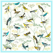 Full size illustration of a bespoke Elwyn New York silk scarf with a Charming blue and yellow warbler birds, flying and perched amidst delicate wild flowers.  Inspired by nature found in the North East.